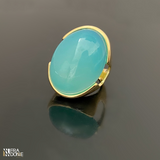 Anel com pedra natural, ágata azul céu, em formato oval, banho a ouro 18k