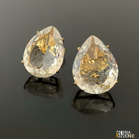 Brincos Cristallo, com cristal incolor em formato de gota, banho a ouro 18k